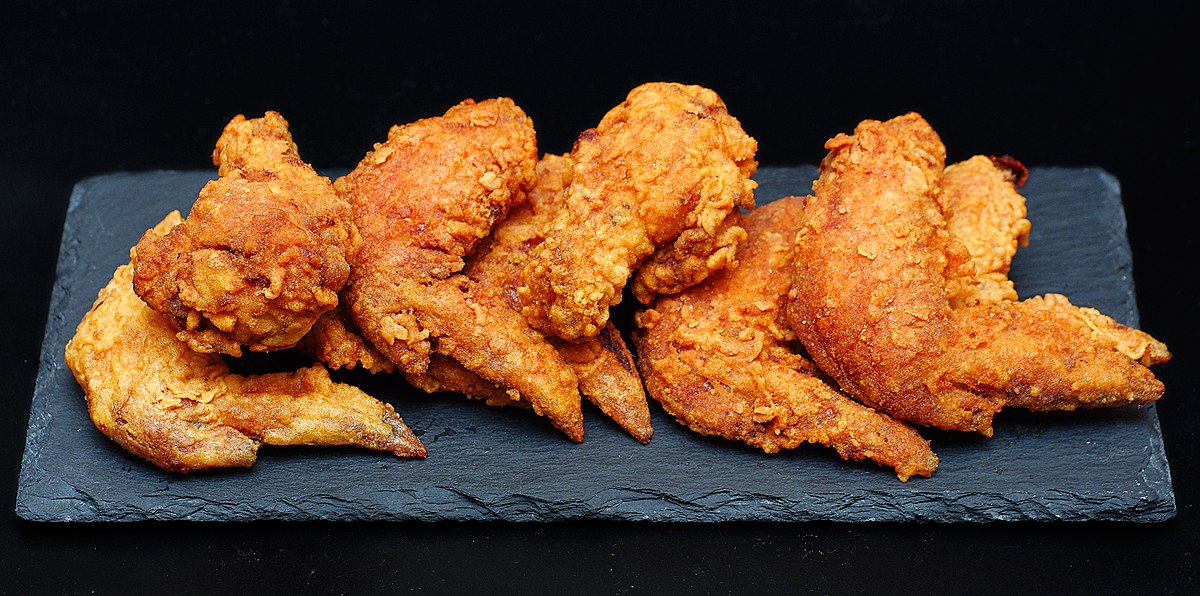 How long to bake frozen chicken wings in the oven at 400 degrees?